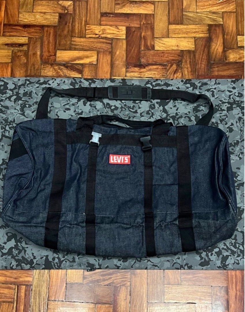 Authentic Levi’s Denim Duffle Bag (Category: Luxury Bags & Wallets) located in Quezon City. Submitted by chloe_declutter (Listing ID 1410023531, Image 1). Description: SUMMER SALE 340 only Selling for a lower price since I’m decluttering All zippers work fine The buckle design has minor flaw, but no function its only design 7 in stock Cubao QC.