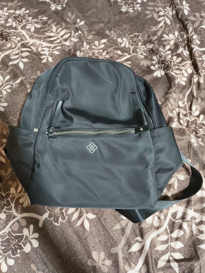 Black Backpack (Category: Backpacks) located in Singapore. Submitted by helloheyhi (Listing ID 1410135619, Image 1). Description: - Stylish black backpack - Adjustable straps - Front zippered pocket - Side pockets - Main zip has no tassel (check last picture for reference) - Perfect for everyday use .
