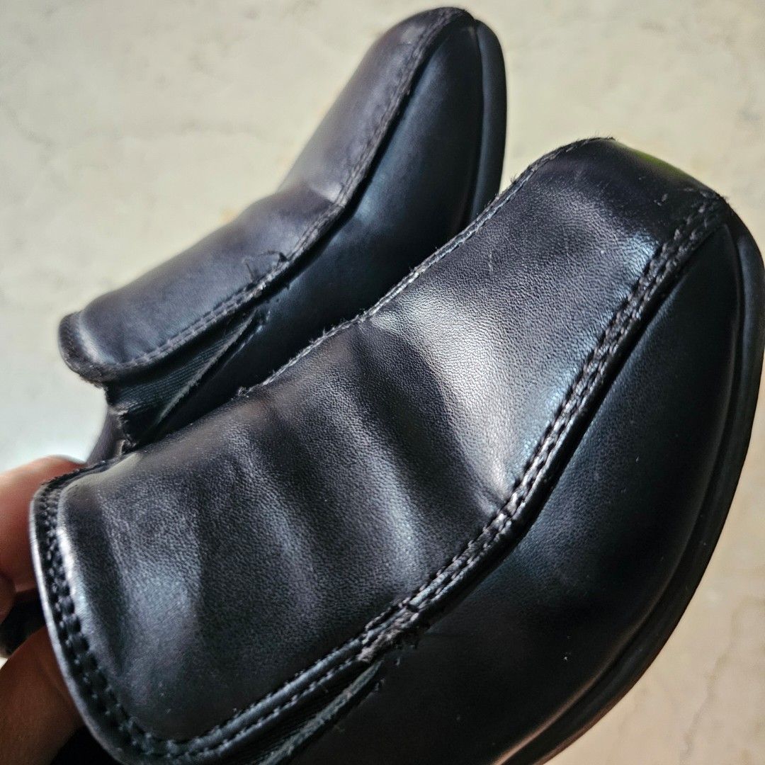 BLACK SCHOOL SHOES for kid (Category: Babies & Kids Fashion) located in Paranaque City. Submitted by mystuffmel (Listing ID 1410061007, Image 3). Description: - Black Polaris slip-on loafers - Sole dimensions: 8 inches (length) x 3 inches (width) - Shows wear and tear on the edges - Black interior with Polaris logo RFS decluttering.