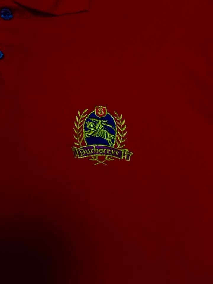 Burberrys Red Polo Shirt(VINTAGE) (Category: Tshirts & Polo Shirts ) located in Tuguegarao City. Submitted by kidbornok (Listing ID 1410143382, Image 2). Description: -Burberrys red polo shirt(Vintage) - Embroidered Burberrys logo -Size LARGE 21X28 - Collared neckline - Color rate 10/10 -No issue.