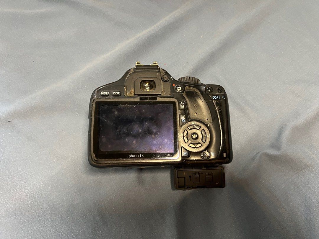 Canon EOS Rebel DSLR Camera (Category: Cameras) located in Manila. Submitted by platano (Listing ID 1410016568, Image 2). Description: BROKEN. 0 chance of survival haha. Hoping to get cash from this. Found in stockroom and was thinking it would be useful as a dummy camera/ for teaching. Just a quick sell.