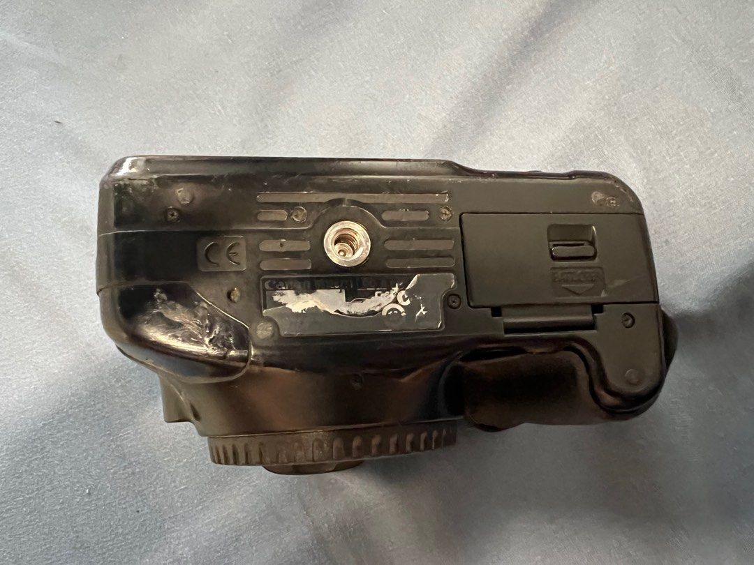Canon EOS Rebel DSLR Camera (Category: Cameras) located in Manila. Submitted by platano (Listing ID 1410016568, Image 3). Description: BROKEN. 0 chance of survival haha. Hoping to get cash from this. Found in stockroom and was thinking it would be useful as a dummy camera/ for teaching. Just a quick sell.