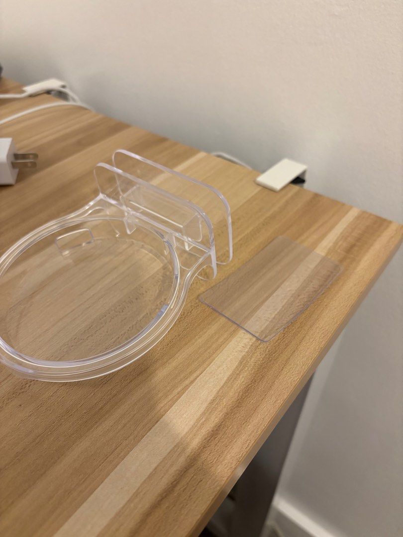 CCTV Stand (Category: Mounts & Holders) located in Taguig. Submitted by shop.jeri (Listing ID 1410043760, Image 2). Description: - Clear wall mount holder - Designed for round objects - Includes separate adhesive for mounting - Made of clear plastic - Circular design with built-in handle.