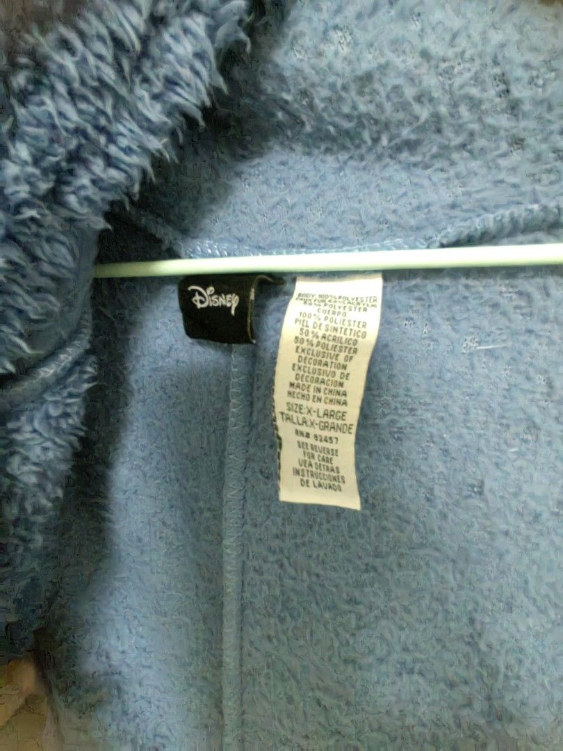 Disney Eeyore Onesie Costume (Category: Undergarments & Loungewear) located in Manila. Submitted by dhyig (Listing ID 1410059691, Image 2). Description: - Disney Eeyore onesie costume - Size: XL-Large - Design: Blue and purple with Eeyore's face on the hood - Material: Soft, plush - Features: Zipper closure for easy wear.