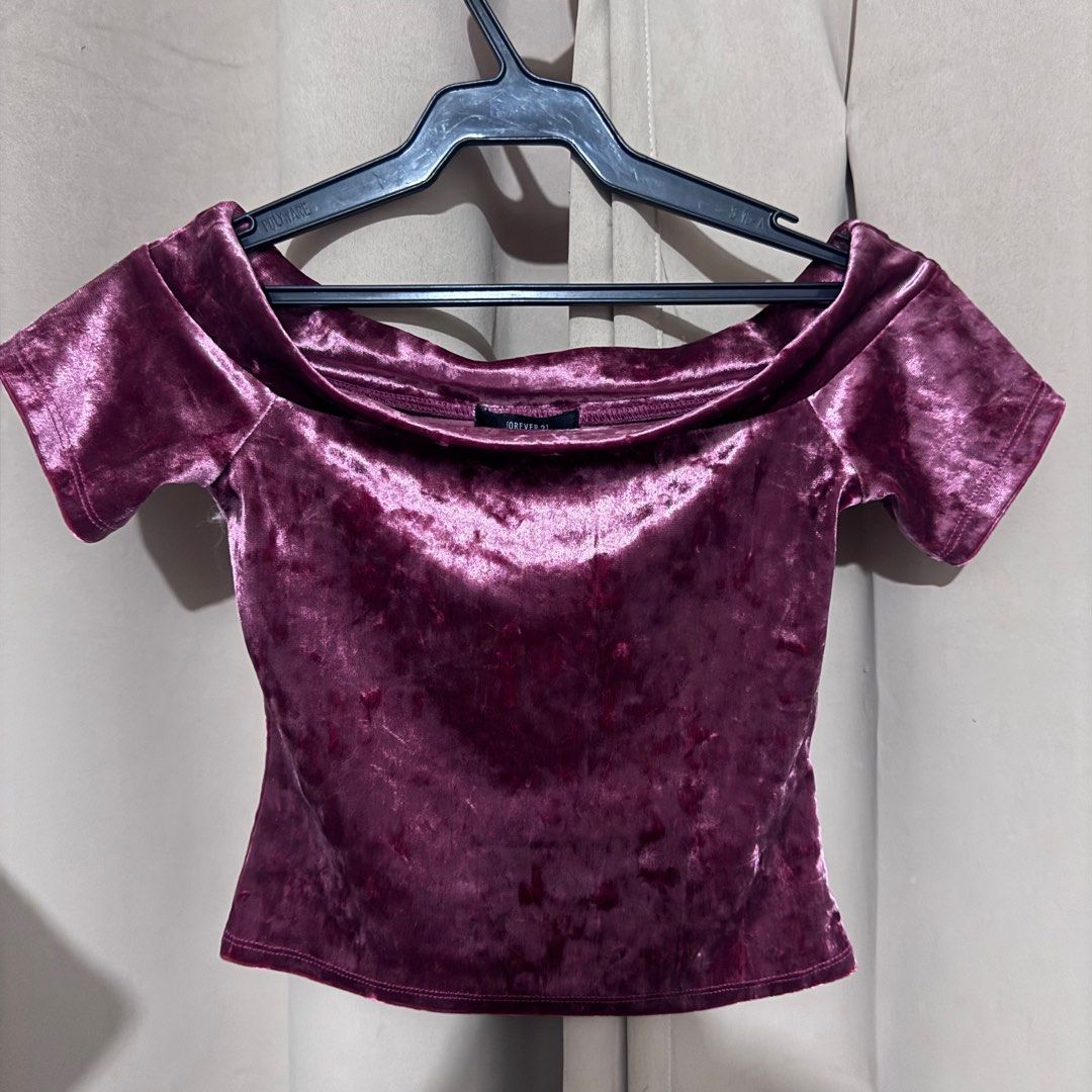 Forever 21 Off-Shoulder Velvet Top Y2K (Category: Others Tops) located in Makati City. Submitted by sheen.declutters (Listing ID 1410135188, Image 1). Description: - Forever 21 off-shoulder top - Soft velvet material - Flattering neckline - Short sleeves - Rich burgundy pink color - Size: Small #Y2K.