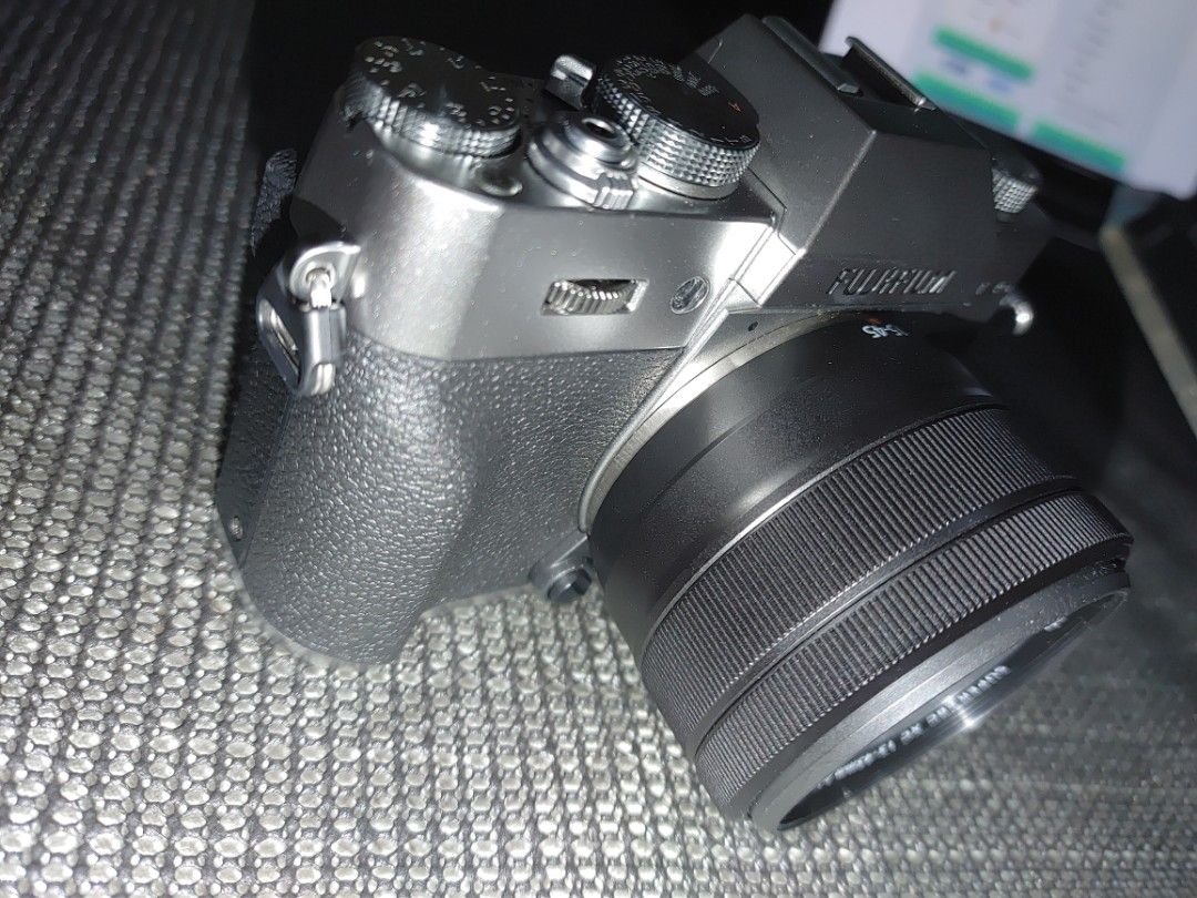 Fujifilm X-T30 II Camera with Lens (Category: Cameras) located in Tarlac. Submitted by dcones84 (Listing ID 1410000806, Image 3). Description: - Fujifilm X-T30 II camera (Silver/Black) - with lens Fujinon XC 15-45mm F3.5-5.6 OIS lens - Includes original box and accessories - Features a flip-out screen - Multiple dials and buttons for easy control Hindi na nagamit at sobra kinis at parang bago pa. well persevere at 832 plang ang shutter. Original 