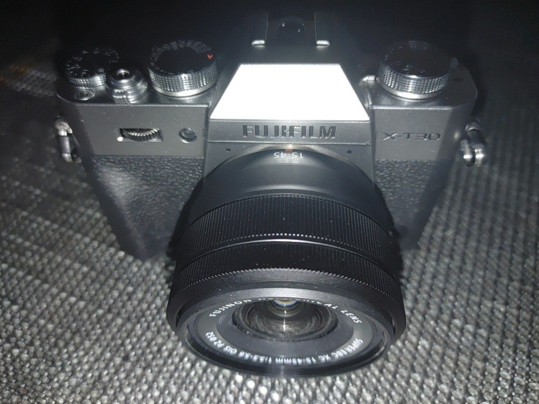 Fujifilm X-T30 II Camera with Lens (Category: Cameras) located in Tarlac. Submitted by dcones84 (Listing ID 1410000806, Image 1). Description: - Fujifilm X-T30 II camera (Silver/Black) - with lens Fujinon XC 15-45mm F3.5-5.6 OIS lens - Includes original box and accessories - Features a flip-out screen - Multiple dials and buttons for easy control Hindi na nagamit at sobra kinis at parang bago pa. well persevere at 832 plang ang shutter. Original 