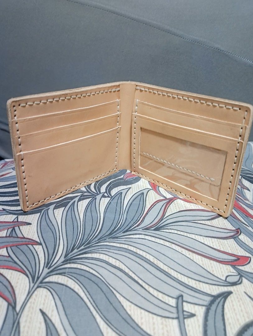 Genuine Vegetable Tanned Leather Wallet (Category: Wallets & Card Holders) located in Hermosa. Submitted by chic2315 (Listing ID 1410023589, Image 2). Description: Genuine Vegetable tanned leather wallet in natural color. Never been used po, it also comes with a box. Handmade and local made. Overtime this will develop a patina. RFS: Impulsive buy.
