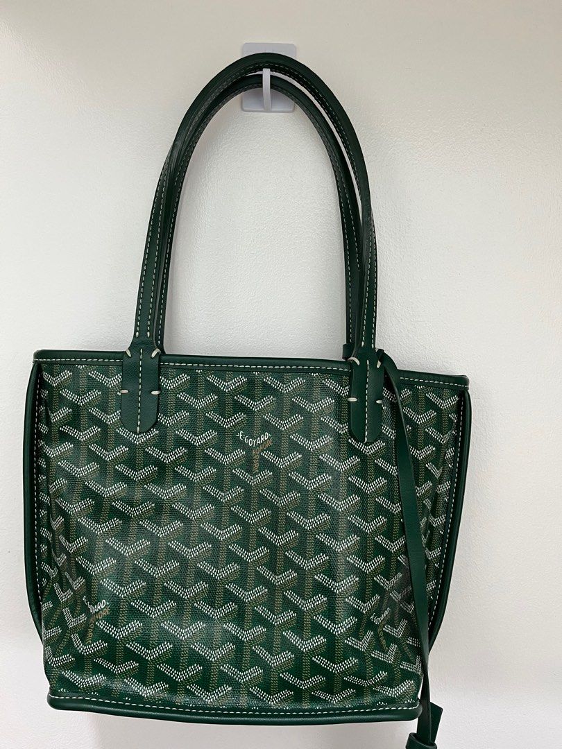 Goyard Green Tote Bag with Pouch (Category: Luxury Bags & Wallets) located in Manila. Submitted by momentsntreasures (Listing ID 1410020871, Image 1). Description: - Goyard mini anjou bag - Green color - Includes matching pouch - Signature Goyardine pattern - Interior stamped "Goyard Paris Made in France" - White stitching - Two top handles.