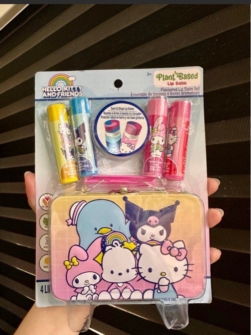 Hello Kitty and Friends Flavored Lip Balm Set (Category: Makeup) located in Cavite. Submitted by kkollections2023 (Listing ID 1410179481, Image 1). Description: - Kitty & Friends Lip Balm Set - Includes 4 lip balms - Plant-based and flavored - Features Kitty, My Melody, Kuromi, and other Sanrio characters - Comes with a cute carrying case - Fun and practical for lip care.