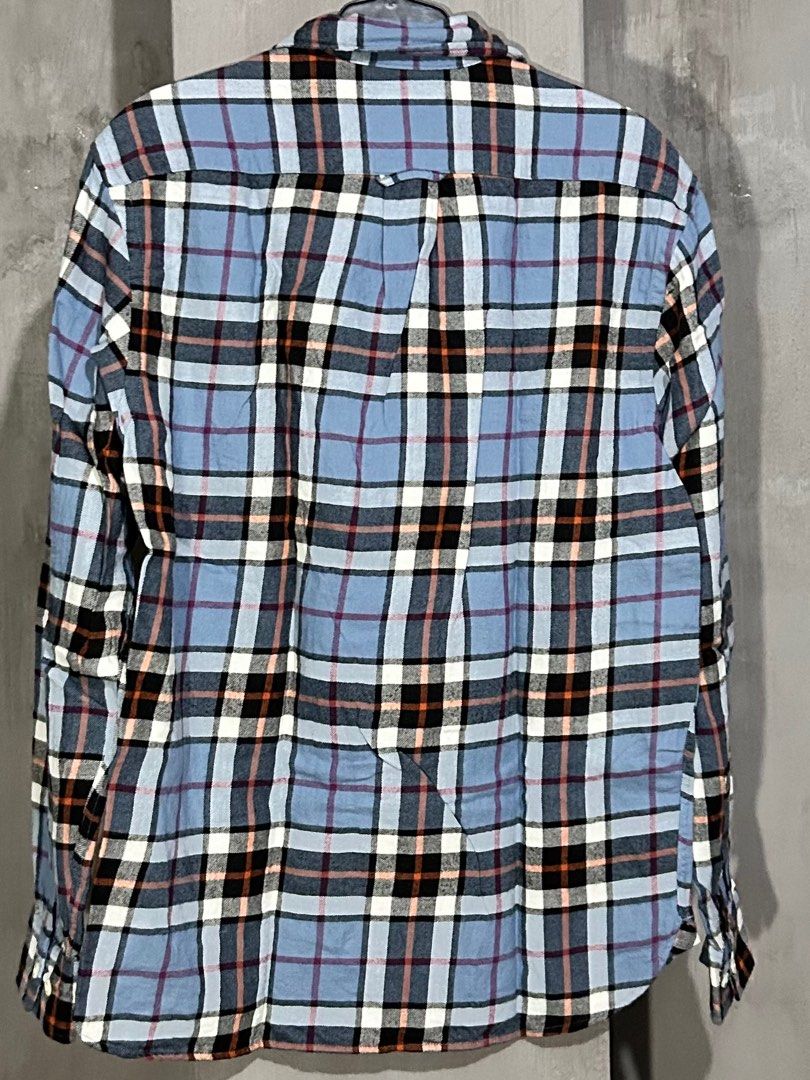 H&M Plaid Flannel Shirt (Category: Tshirts & Polo Shirts ) located in Pasay City. Submitted by inss1 (Listing ID 1410096697, Image 3). Description: - H&M blue plaid flannel shirt - Button-down collar - Long sleeves - Classic plaid pattern (blue, black, white, orange) - Buttoned cuffs - 17x28.