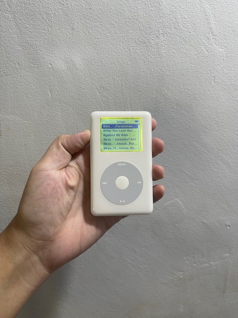 iPod classic 4th gen monochrome 16gb (Category: Portable Music Players) located in Manila. Submitted by apple_siri (Listing ID 1409998464, Image 2). Description: Newly repaired lcd Naka taptic engine galing ng iphone kaya pag cliniclick or ginagalawa buttons and click wheel may vibrate From hard drive naka compact flash card na sya kaya battery good condition with replacement charging chord and original apple adapter .