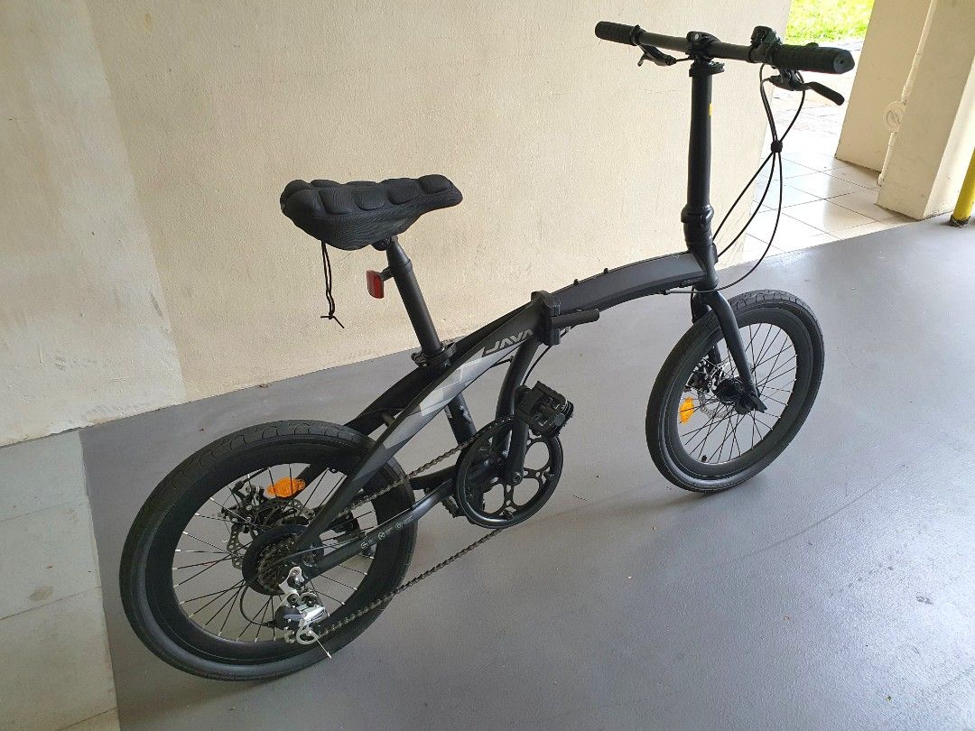 Java Zelo Foldable Bicycle (Category: Bicycles) located in Singapore. Submitted by c.riv_03 (Listing ID 1410055288, Image 2). Description: WTS JAVA ZELO 20" Foldable Bicycle Black 🖤 Almost new 9.5/10 Condition -Java Aluminum Alloy -Shimano 7 Speed Gears -52T Crankset -20" Double walled Rims -20kg Weight -120kg Maximum Load RFS: Too small for me Sengkang.