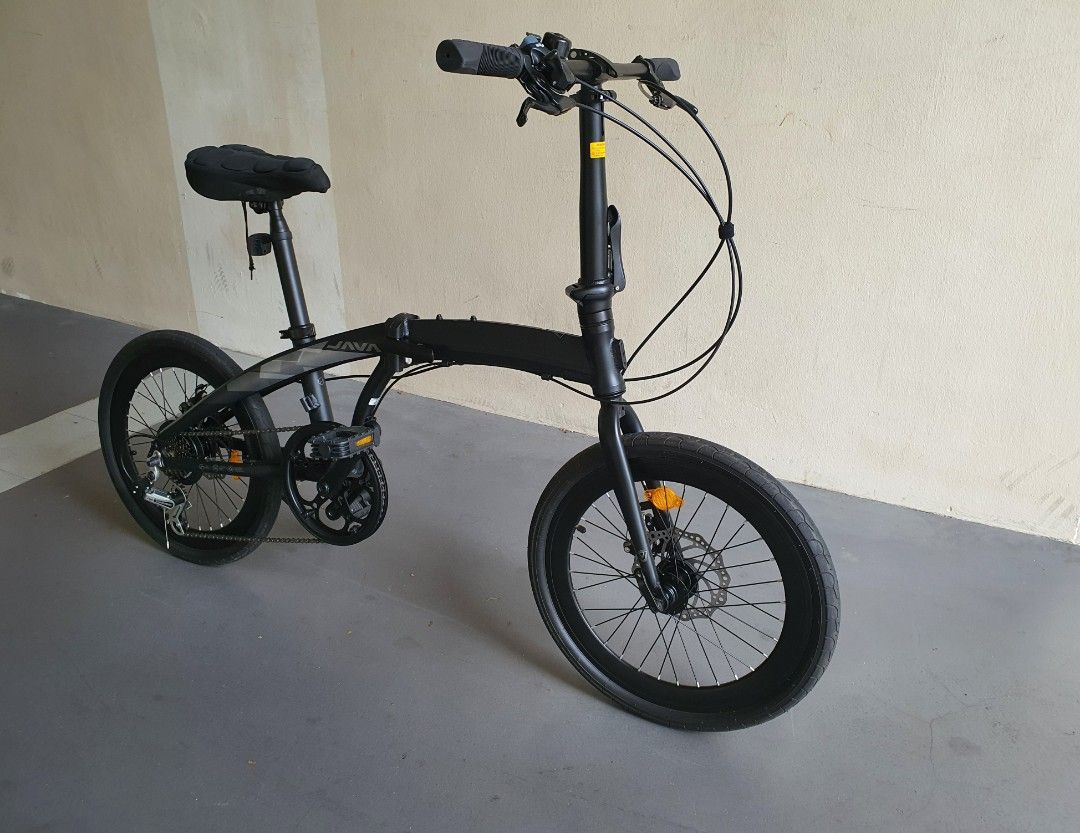Java Zelo Foldable Bicycle (Category: Bicycles) located in Singapore. Submitted by c.riv_03 (Listing ID 1410055288, Image 3). Description: WTS JAVA ZELO 20" Foldable Bicycle Black 🖤 Almost new 9.5/10 Condition -Java Aluminum Alloy -Shimano 7 Speed Gears -52T Crankset -20" Double walled Rims -20kg Weight -120kg Maximum Load RFS: Too small for me Sengkang.
