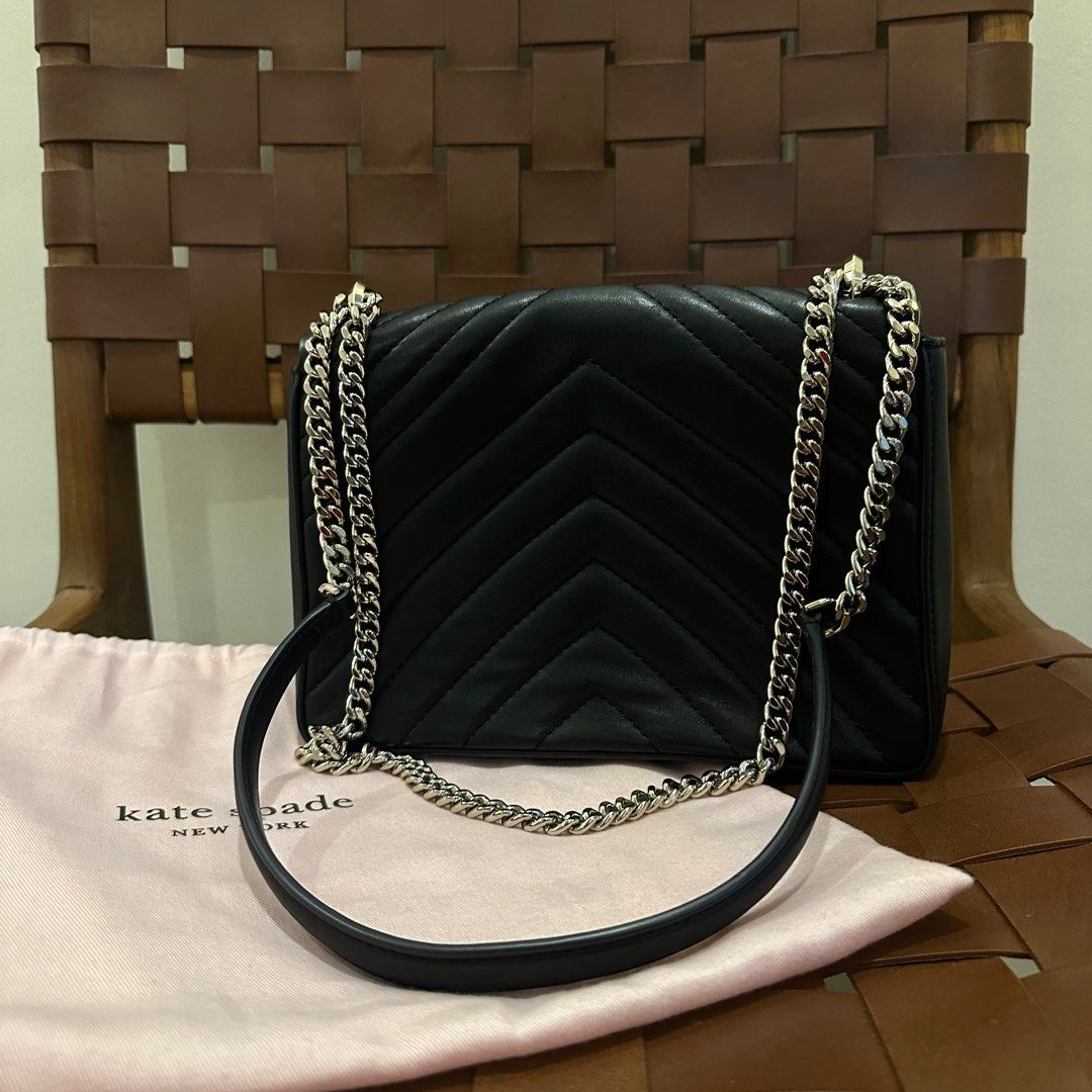 Amelia Medium Convertible Shoulder Bag | Kate Spade NYC (Category: Luxury Bags & Wallets) located in Manila. Submitted by waldorf024 (Listing ID 1410081086, Image 3). Description: - Kate Spade New York shoulder bag - Black color - Quilted design - Spade logo on front - Chain strap - Includes dust bag - Multiple interior compartments - Kate Spade New York logo inside.