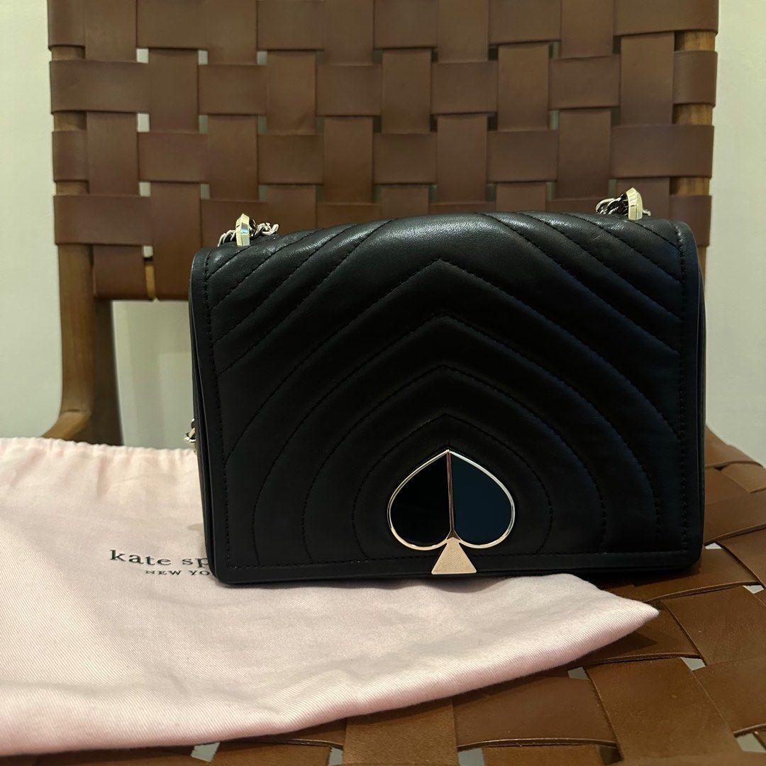 Amelia Medium Convertible Shoulder Bag | Kate Spade NYC (Category: Luxury Bags & Wallets) located in Manila. Submitted by waldorf024 (Listing ID 1410081086, Image 2). Description: - Kate Spade New York shoulder bag - Black color - Quilted design - Spade logo on front - Chain strap - Includes dust bag - Multiple interior compartments - Kate Spade New York logo inside.