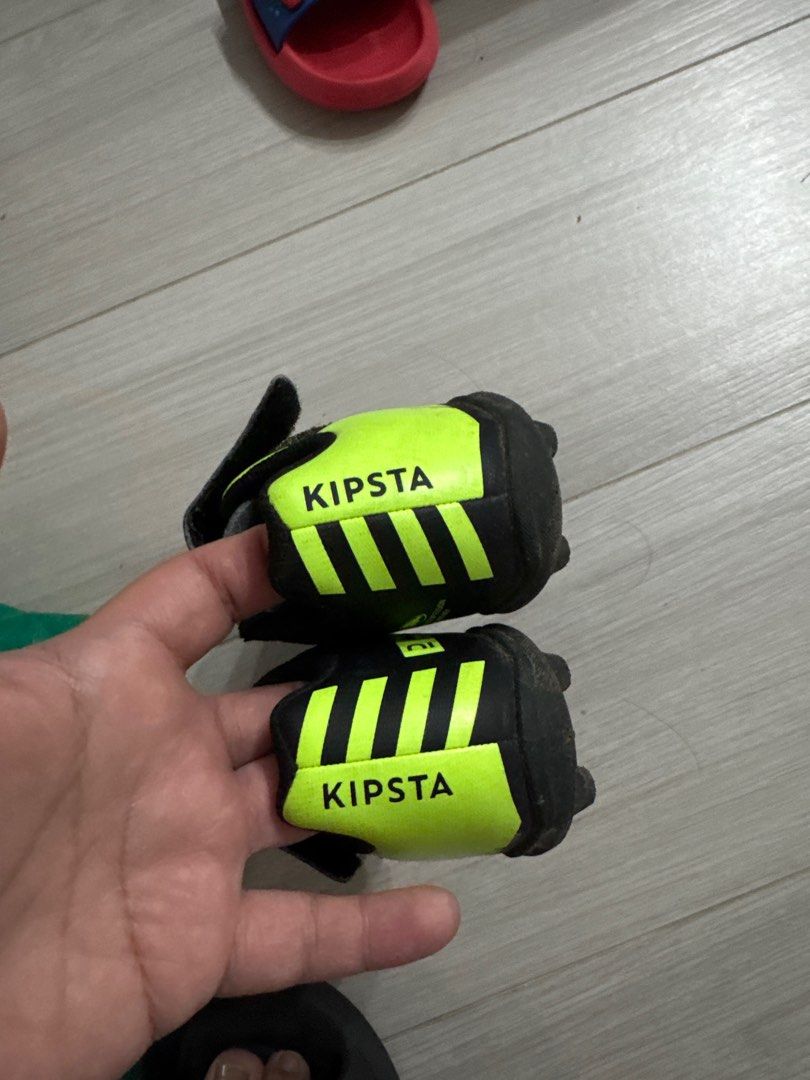Kipsta Football Shoes (Category: Babies & Kids Fashion) located in Manila. Submitted by blanjee (Listing ID 1410019331, Image 3). Description: - Kipsta football boots - Color: Black and neon green - Hook-and-loop strap for easy wear - Cleated soles for field traction Decathlon Soccer Shoes for Kids Used for 2 to 3x I removed the Decathlon Tag, size is 30.