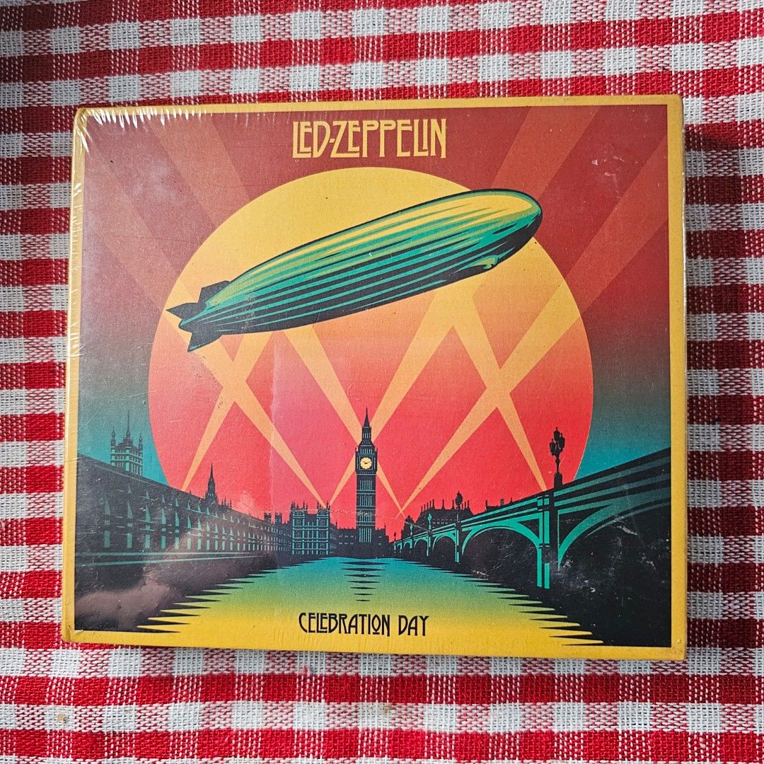Led Zeppelin Celebration Day CD + DVD (Category: CDs & DVDs) located in Quezon City. Submitted by serefrenpaz (Listing ID 1410108517, Image 1). Description: Led Zeppelin Celebration Day DVD. Recorded live December 10th, 2007, at the O2 Arena, London. Features tracks like "Good Times Bad Times", "Black Dog", "Kashmir", and "Whole Lotta Love". Includes a DVD with the concert footage. The item is still sealed in its original packaging..