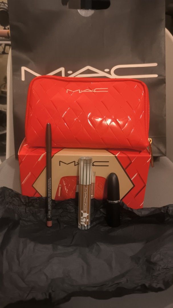 MAC Trending Tomorrow Lip Trio: Nude (Category: Makeup) located in Tarlac. Submitted by kapao_toys_collectibles (Listing ID 1410046836, Image 3). Description: - Limited Edition MAC Lip Trio - Includes: Lipstick (silky matte finish), Lip Pencil, and Lipglass - Comes with a red quilted makeup bag - Ideal for creating a nude lip look.