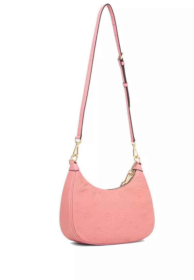 Michael Kors Pink Shoulder/sling Bag (Category: Luxury Bags & Wallets) located in Dasmarinas. Submitted by berrylove_preloved (Listing ID 1410087981, Image 3). Description: - Michael Kors shoulder bag - Soft pink color - Gold chain detail - Adjustable long strap - Zip closure - Multiple interior compartments - Subtle embossed pattern.