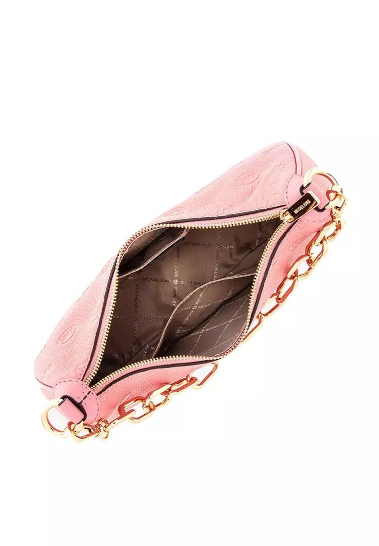 Michael Kors Pink Shoulder/sling Bag (Category: Luxury Bags & Wallets) located in Dasmarinas. Submitted by berrylove_preloved (Listing ID 1410087981, Image 2). Description: - Michael Kors shoulder bag - Soft pink color - Gold chain detail - Adjustable long strap - Zip closure - Multiple interior compartments - Subtle embossed pattern.