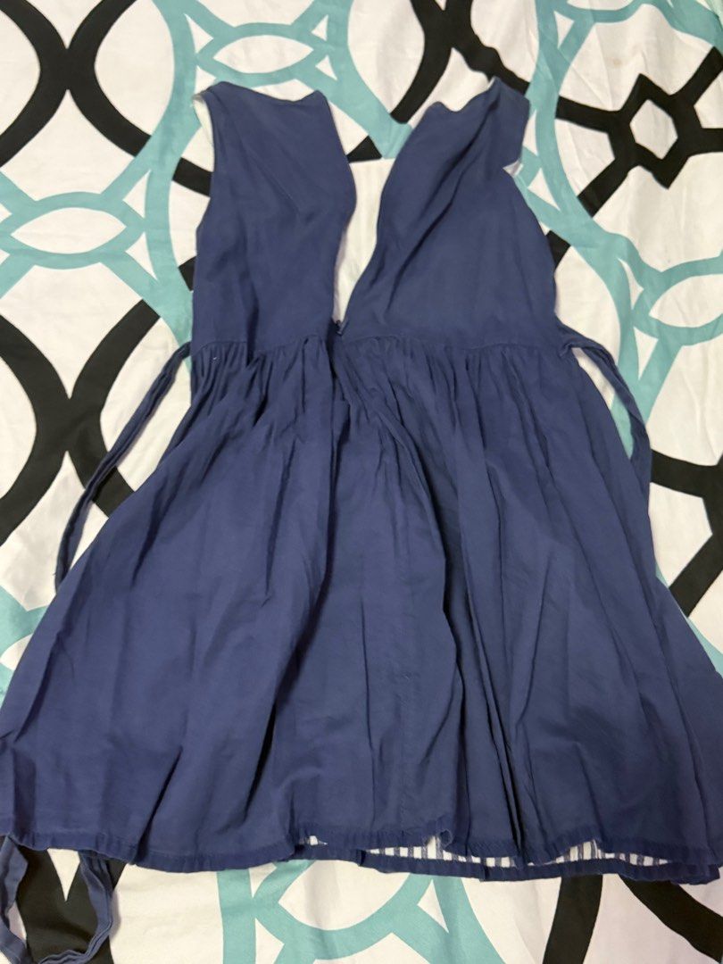 Navy Blue Striped Dress (Category: Babies & Kids Fashion) located in Bacoor. Submitted by rizza_455 (Listing ID 1410095609, Image 3). Description: Elle brand - Navy blue dress - Striped front panel - Solid navy blue sides and back - Scoop neckline - Flared skirt - Tie back detail - Small gold emblem - Lightweight fabric - Suitable for warm weather Fit to 3-4 yrs old petite .