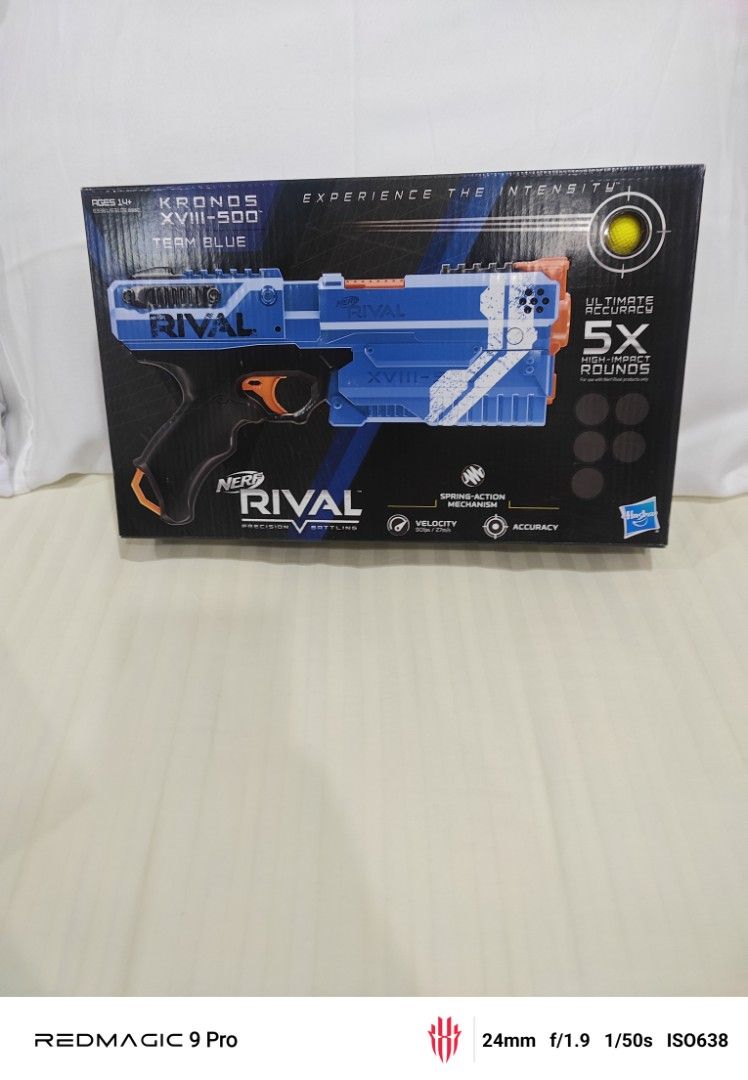 Nerf Rival Kronos XVIII-500 - Team Blue (Category: Action & Battle Toys) located in Manila. Submitted by tochi090910 (Listing ID 1410134391, Image 1). Description: - Nerf Rival Kronos XVIII-500 (Team Blue) - Spring-action - Includes 5 rounds - Features the Nerf Rival logo - Color scheme: Blue with orange and white accents.