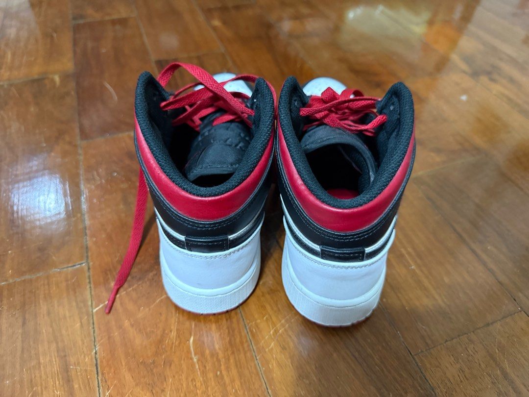 Nike Air Jordan 1 Mid - Black/White/Red (Category: Sneakers) located in Muntinlupa City. Submitted by _lasonrisaa (Listing ID 1410160361, Image 3). Description: Nike Air Jordan Mid in Womens US Size 7 MOD: Bank Transfer/Gcash Shipping to be covered by buyer Negotiable (: .