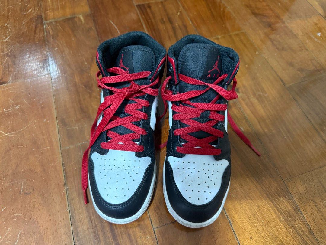 Nike Air Jordan 1 Mid - Black/White/Red (Category: Sneakers) located in Muntinlupa City. Submitted by _lasonrisaa (Listing ID 1410160361, Image 1). Description: Nike Air Jordan Mid in Womens US Size 7 MOD: Bank Transfer/Gcash Shipping to be covered by buyer Negotiable (: .