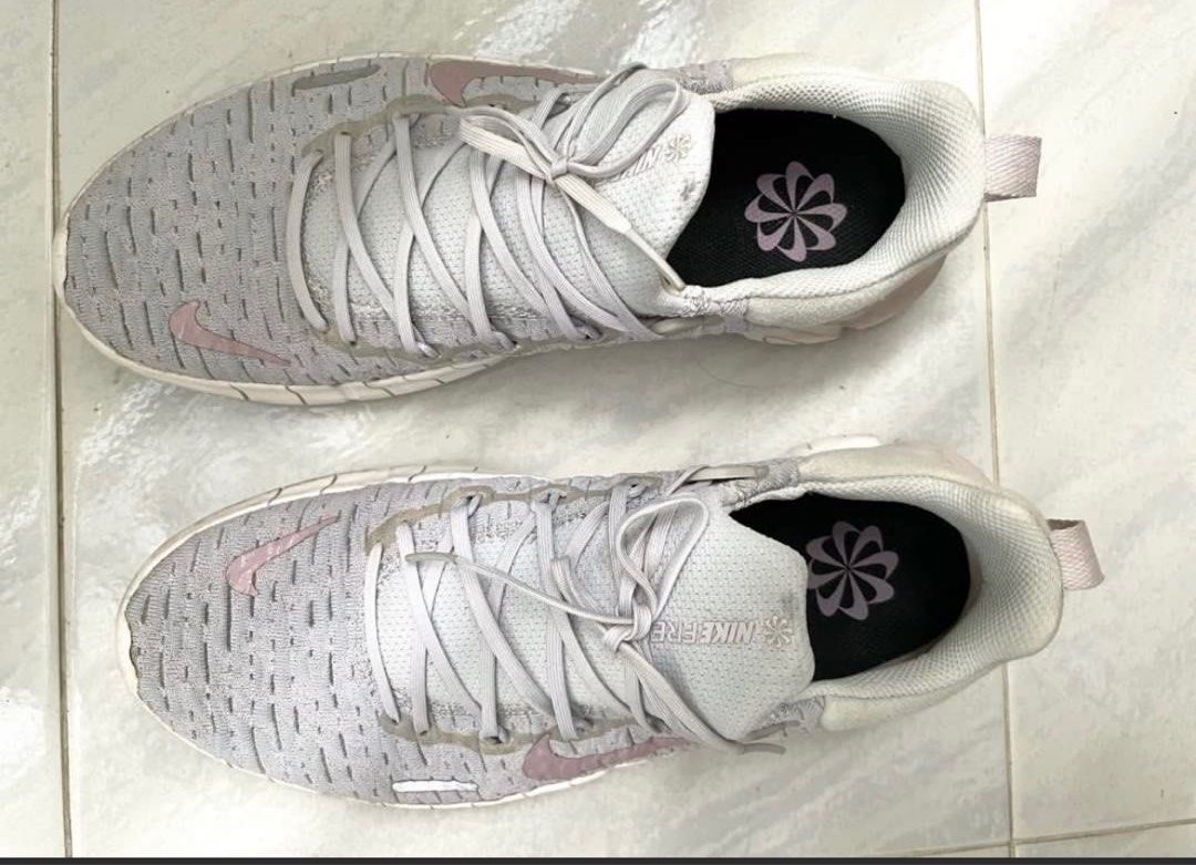 Nike Free 5.0 Sneakers (Category: Sneakers) located in Quezon City. Submitted by k.rgnz (Listing ID 1410118747, Image 2). Description: - Nike Free 5.0 sneakers size 6.5 - Light grey and pink colorway - Breathable knit upper - Lace-up closure - Flexible sole - Nike swoosh logo on side - barely used - will clean before shipping.