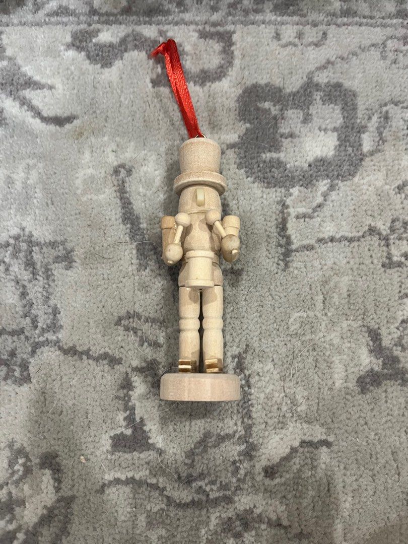 Nutcracker ornament (Category: Toy Figures) located in Singapore. Submitted by amberglades_ (Listing ID 1410120547, Image 1). Description: - Wooden nutcracker ornament - Bought from the US - Good to personalise the nutcracker.
