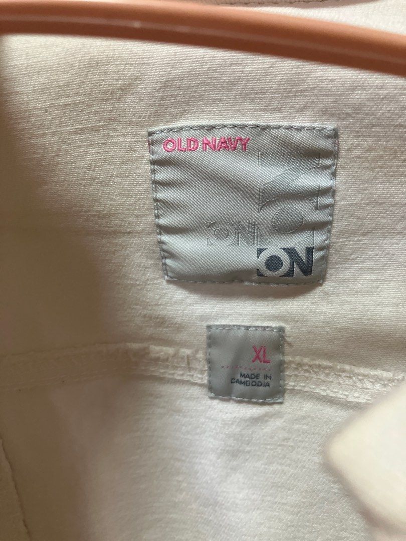 Old Navy White Denim Jacket XL (Category: Babies & Kids Fashion) located in Binan City. Submitted by mrsjca (Listing ID 1410043999, Image 3). Description: - Old Navy white denim jacket - Size: XL for pre teens - Classic design - Button closures - Pockets - Made in Cambodia - Versatile layering piece - slightly yellowed due to storage but can be restored with proper washing.