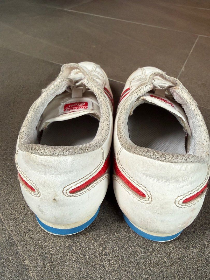 Onitsuka Tiger Kids Sneakers (Category: Babies & Kids Fashion) located in Bacolod City. Submitted by re-kindle (Listing ID 1410023067, Image 2). Description: - Onitsuka Tiger sneakers - White with red stripes - Velcro strap and laces - Blue sole - Size: US 1, EUR 32.5, 20 cm - Material: Synthetic leather upper, rubber sole - Made in Vietnam.