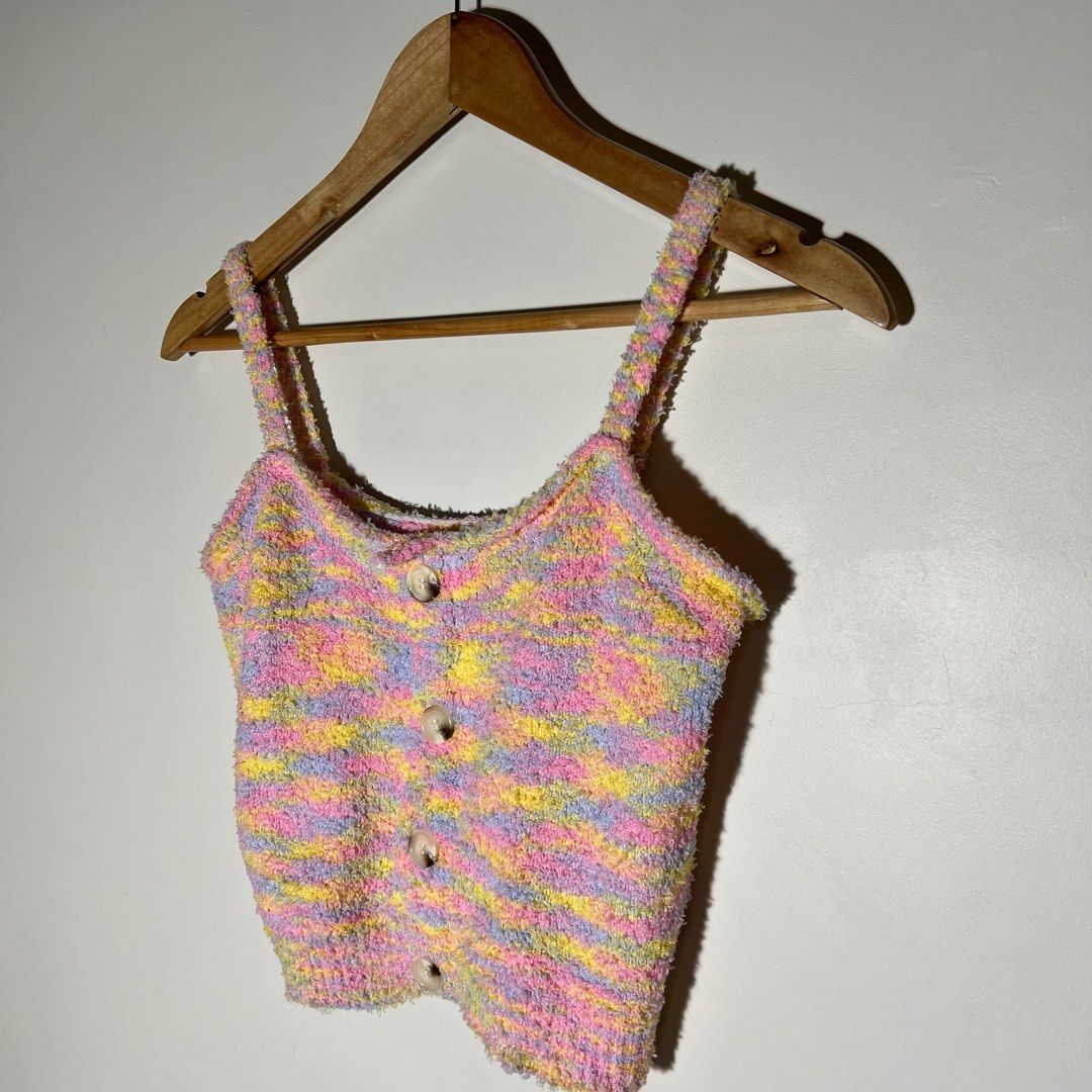 Pastel Rainbow Fuzzy Knit Button Crop Top (Category: Sleeveless) located in Paranaque City. Submitted by shopdeclutterfly (Listing ID 1410174873, Image 2). Description: BRAND: None BEST FITS: S-M Message me for more information. Important Notes: — Color may vary slightly due to lighting and screen settings. — This is a preloved item. — Minor signs of wear may be present — There may be small stains, dots, or marks due to storage and previous use. 