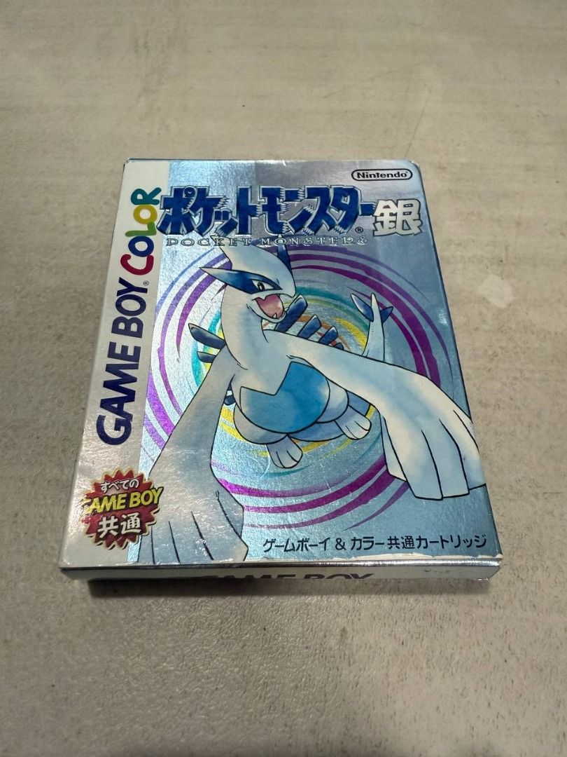 Pokemon Silver Game Boy Color JP (Category: Nintendo) located in Manila. Submitted by pael92 (Listing ID 1410175139, Image 2). Description: - Pokemon Silver for Game Boy Color - Includes game cartridge, box, and manual - Cartridge in protective case - Box features Lugia artwork - Game is in Japanese.