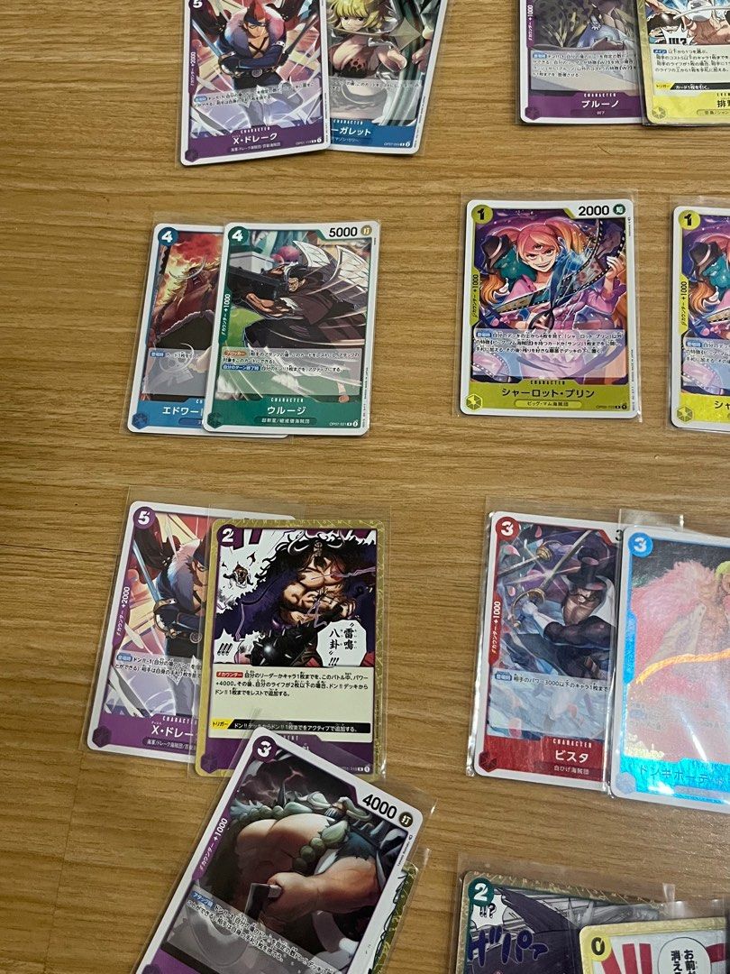 Rare 74pcs - One Piece Japanese Bulk (Category: Raw Singles) located in Taguig. Submitted by kghobbies (Listing ID 1410152513, Image 3). Description: All Cards are Sleeved All Rare Cards 74pcs Take all only.