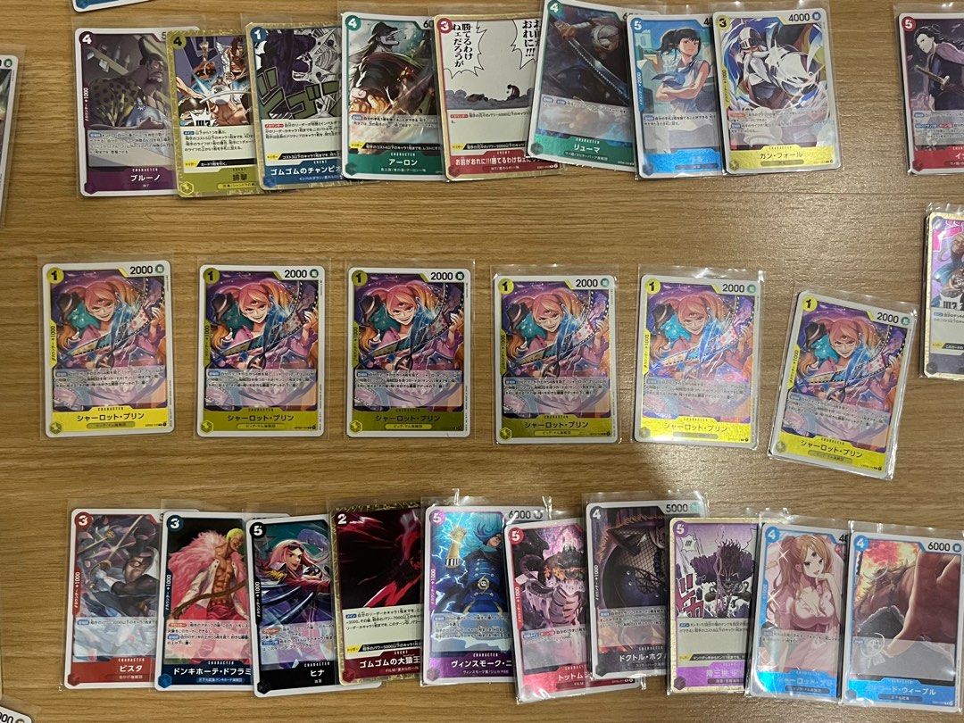 Rare 74pcs - One Piece Japanese Bulk (Category: Raw Singles) located in Taguig. Submitted by kghobbies (Listing ID 1410152513, Image 2). Description: All Cards are Sleeved All Rare Cards 74pcs Take all only.