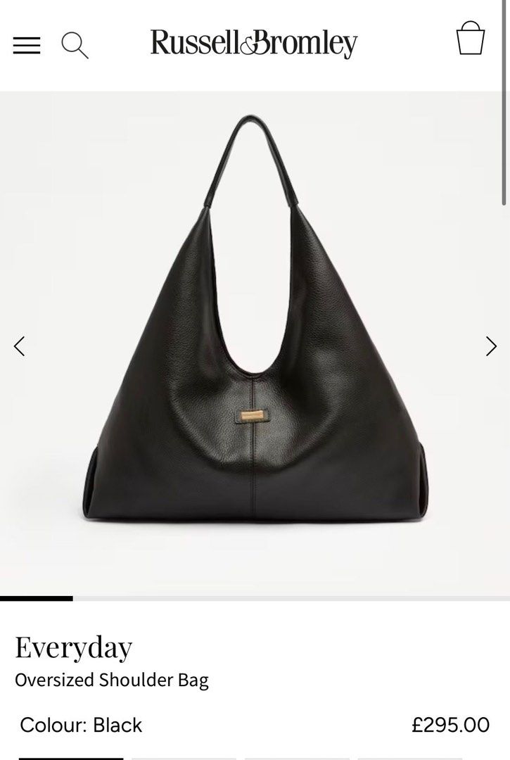 Russell & Bromley Everyday Oversized Shoulder Bag (Category: Shoulder Bags) located in Taguig. Submitted by ellejay8 (Listing ID 1409997310, Image 3). Description: - Russell & Bromley oversized shoulder bag - Large, slouchy design - Single shoulder strap - Includes dust bag - Gold-toned accent on the front - Made of a textured, leather-like material.