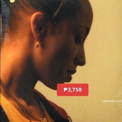 Sade - Lovers Rock vinyl (Category: Vinyls) located in Manila. Submitted by jhenaloymerchandise (Listing ID 1410110271, Image 1). Description: Sade - Lovers Rock vinyl Brand New sealed.