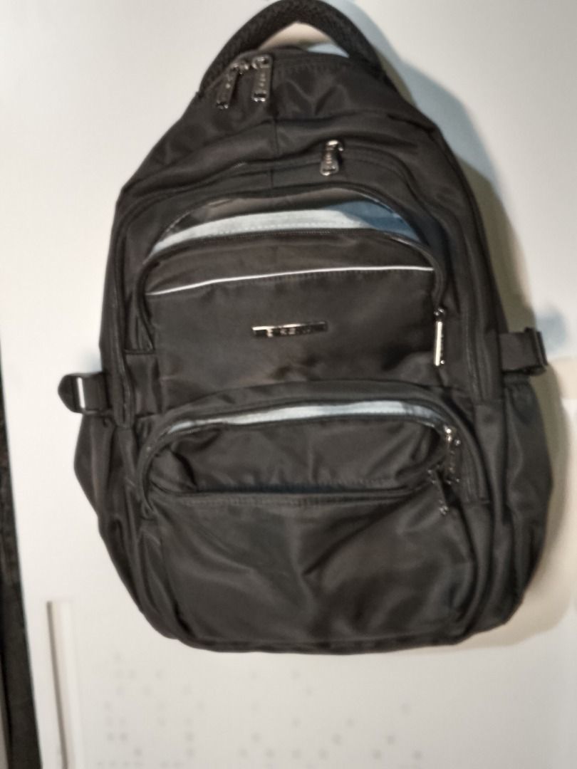 Sena Backpack NEGOTIABLE! (Category: Backpacks) located in Manila. Submitted by lime_onasan888 (Listing ID 1410135107, Image 1). Description: - Never used - 5 zippers, 11 compartments - Top handle and adjustable shoulder straps - Sena logo on front - Durable, possibly water-resistant material - Straps have foam inside - I prefer meet-ups kasi I live very near SM San Lazaro naman (tsaka ayaw ko na rin kasi mag-asikaso ng cash out kung online ako b