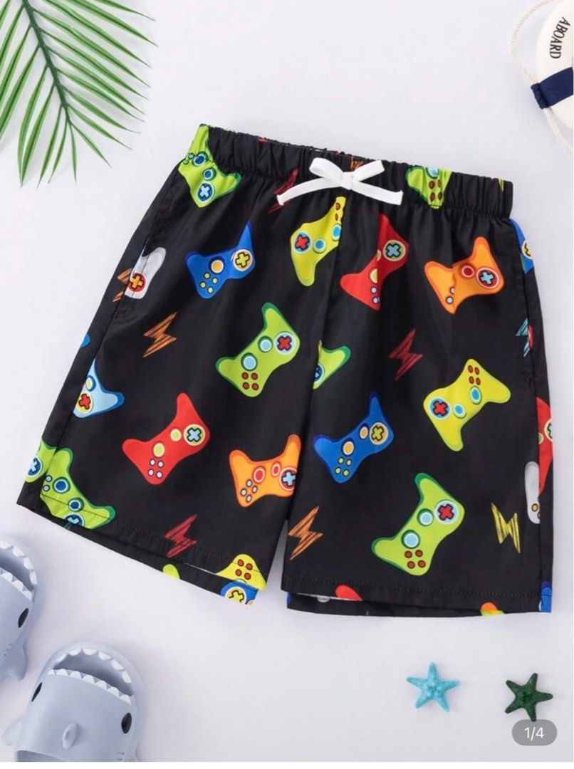 Shein Kids' Gaming Print Shorts (Category: Babies & Kids Fashion) located in Quezon City. Submitted by haylow (Listing ID 1410067405, Image 1). Description: - Black shorts with a fun gaming controller print. - Features an elastic waistband and white drawstring. - Lightweight and comfortable. - Ideal for casual wear or the beach. - Perfect for kids who love gaming!.