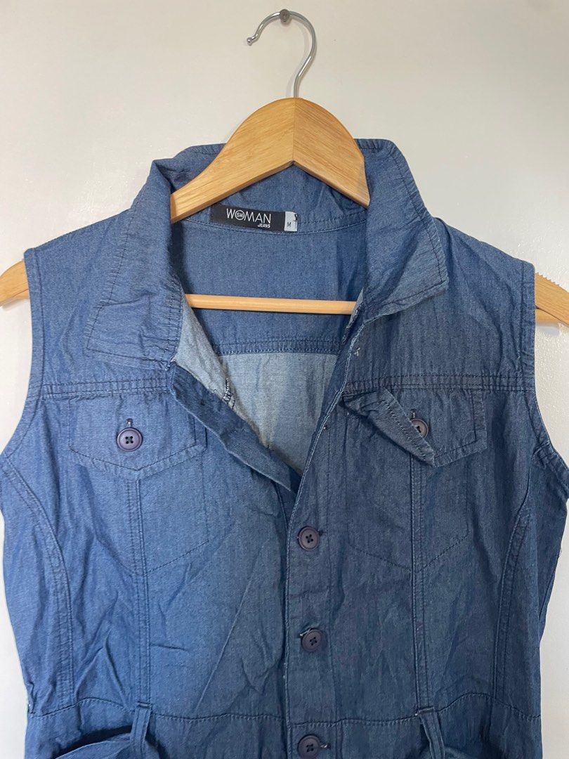 SM Woman Jeans Sleeveless Jumpsuit - Medium (Category: Jumpsuits) located in Cavite. Submitted by _nicoffee (Listing ID 1410085196, Image 1). Description: - SM Woman Jeans jumpsuit - Sleeveless design - Denim material - Blue color - Medium size - Collared neckline - Button-down front - Includes belt.