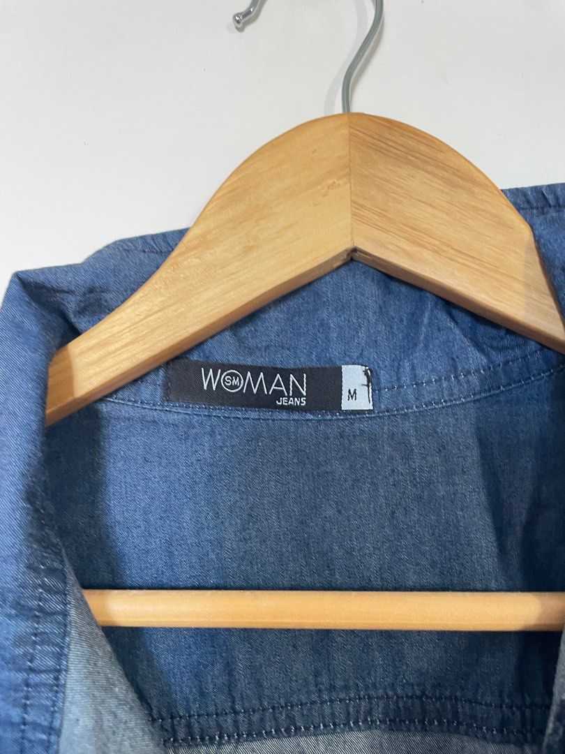 SM Woman Jeans Sleeveless Jumpsuit - Medium (Category: Jumpsuits) located in Cavite. Submitted by _nicoffee (Listing ID 1410085196, Image 3). Description: - SM Woman Jeans jumpsuit - Sleeveless design - Denim material - Blue color - Medium size - Collared neckline - Button-down front - Includes belt.