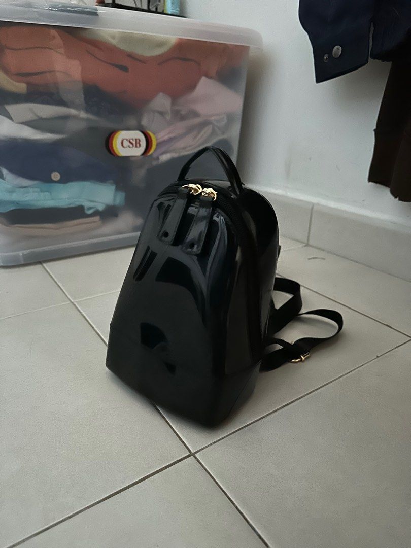 small black backpack (Category: Backpacks) located in Singapore. Submitted by NanaKo (Listing ID 1410102514, Image 1). Description: -bought overseas -adjustable straps -really small, cute, petite backpack that can fit wallet,phone, etc -used only a couple of times -meetups only.