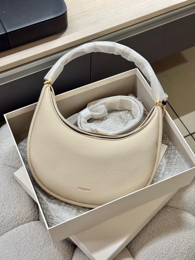 Songmont Luna Bag (Medium) Ivory (Category: Shoulder Bags) located in San Juan City. Submitted by nikkakelly (Listing ID 1410003885, Image 3). Description: [FOR SALE - BRAND NEW] 💓 • Ivory color (1 pc) • On-hand 🇵🇭 • 100% Authentic 📍Location: Can ship from Quezon City 💰 MOP: Gcash / BPI / Metrobank 🚚 MOD: Lalamove / Grab / J&T.