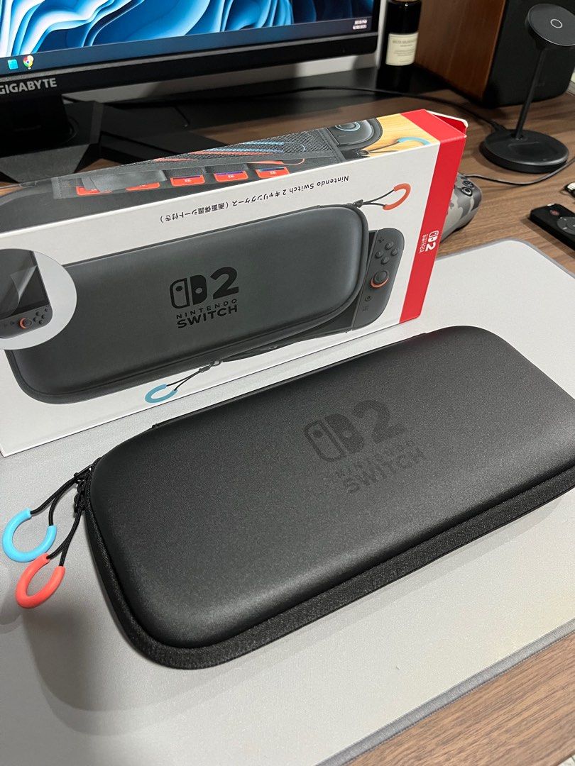 Switch 2 official casing (Category: Cases & Covers) located in Singapore. Submitted by leekc93 (Listing ID 1410143595, Image 2). Description: - Switch 2 official casing - As good as new - Casing with screen protector only - COD at Raffles Place MRT @ 6pm.