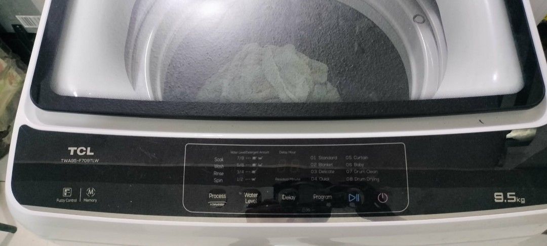 TCL Top Load Washing Machine 9.5kg (Category: Washing Machines and Dryers) located in Rodriguez. Submitted by swiftwolf-dfd7eb (Listing ID 1410076140, Image 2). Description: - TCL Top Load Washing Machine - 9.5kg Capacity - Multiple Wash Cycle Options - White Body - Black Control Panel and Top Lid - Model Number Visible.