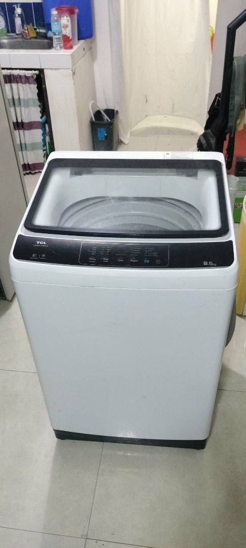 TCL Top Load Washing Machine 9.5kg (Category: Washing Machines and Dryers) located in Rodriguez. Submitted by swiftwolf-dfd7eb (Listing ID 1410076140, Image 1). Description: - TCL Top Load Washing Machine - 9.5kg Capacity - Multiple Wash Cycle Options - White Body - Black Control Panel and Top Lid - Model Number Visible.