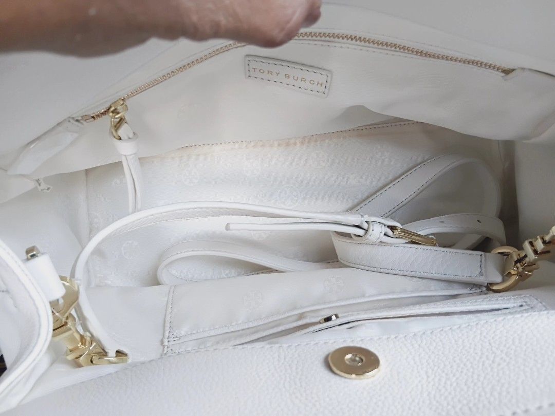 Tory Burch Mercer Dome Bag - New Ivory (Category: Luxury Bags & Wallets) located in Batangas. Submitted by ricardodanielasinas (Listing ID 1410090685, Image 3). Description: - Authentic Tory Burch Mercer Dome Bag - Color: New Ivory - Features: - Top handle - Detachable shoulder strap - Gold-tone hardware - Zip closure - Interior: - Zip pocket - Slip pocket - Includes original tag - Size: OS.