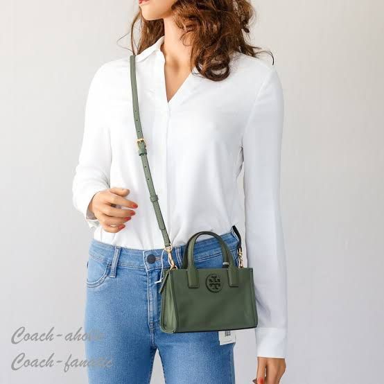 Tory Burch Mini Satchel Crossbody Bag (Category: Luxury Bags & Wallets) located in Pasig City. Submitted by ainee.and.emmett (Listing ID 1410012215, Image 1). Description: - Mini satchel crossbody bag - Olive green color - Structured silhouette - Top handle - Detachable, adjustable shoulder strap - Flap closure with logo detail - Gold-tone hardware - Small size - Perfect for everyday use Sale for 5599.